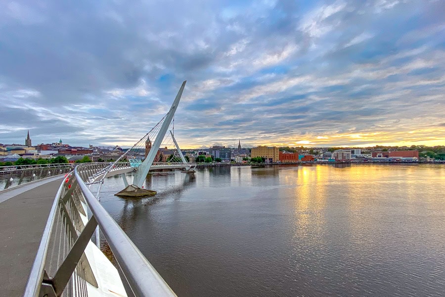 View from the Peace Bridge looking west towards Derry at sunset where we finished our Ireland road trip.