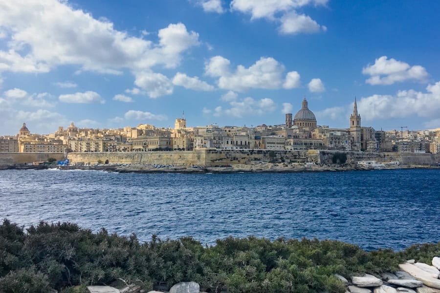 The city of Valetta rises above the water, one of the best places in Malta to visit.