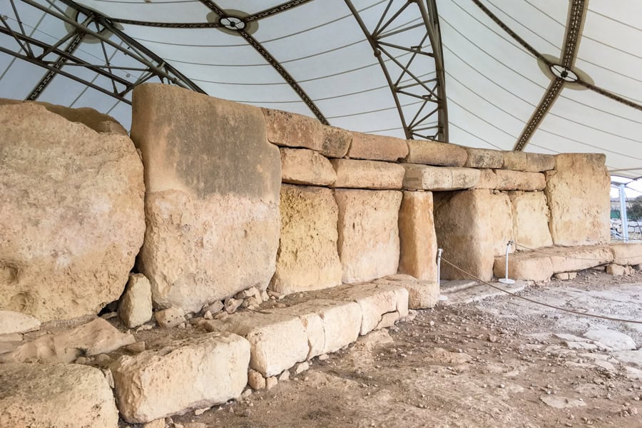 Huge stones form a megalithic doorway at Hagar Qim temple, one of the highlights of Malta.