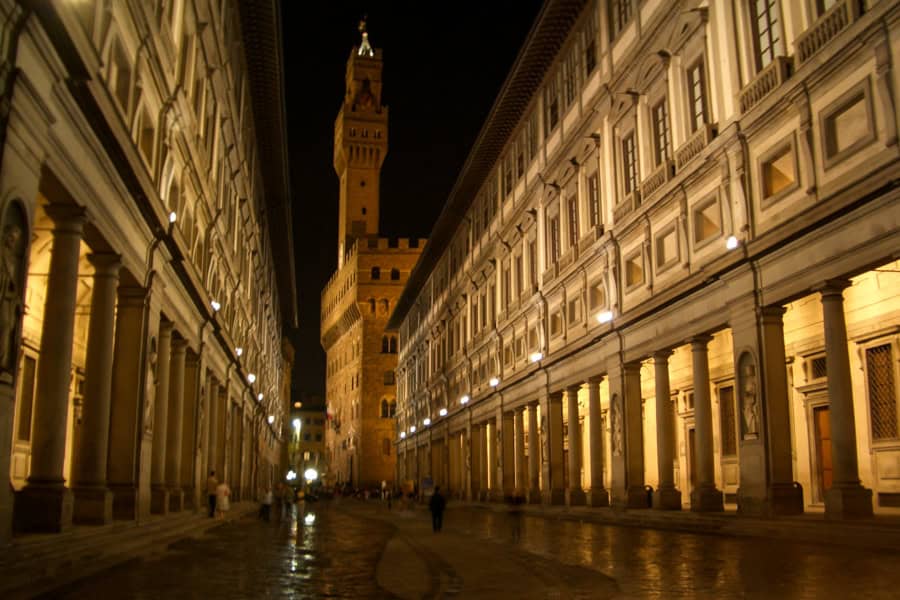 Nighttime view of Florence highlights, the Uffizi Gallery and Palazzo Vecchio.