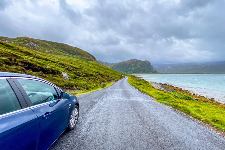 Dramatic view of the road alongside Loch Eriboll on our Scottish highlands road trip.