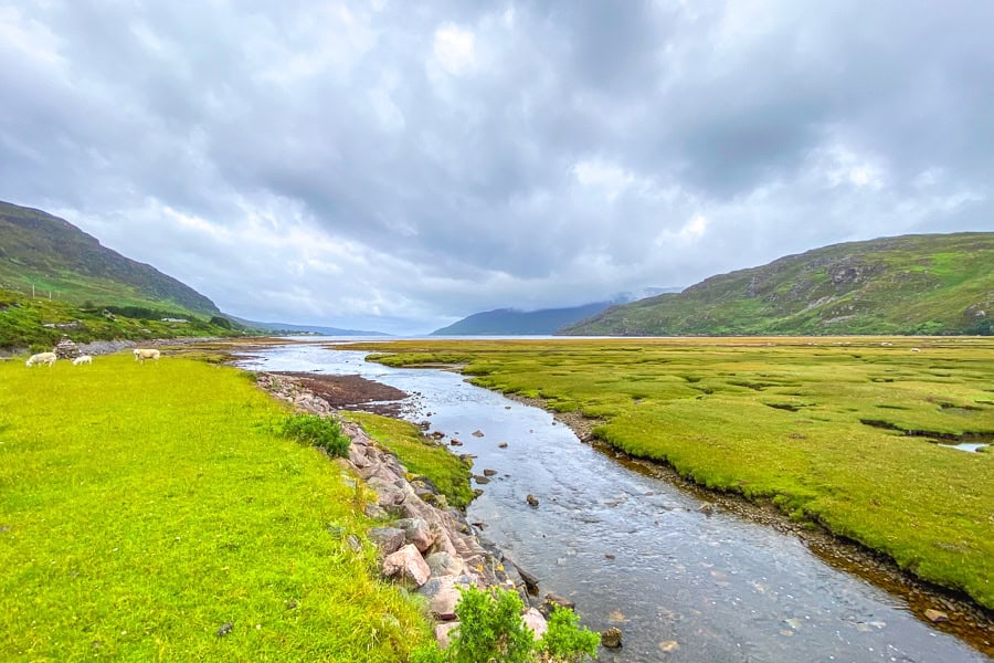 Sweeping loch and mountain scenery along the very green A832 to Gruinard Beach on day 5 of our north coast 500 itinerary.