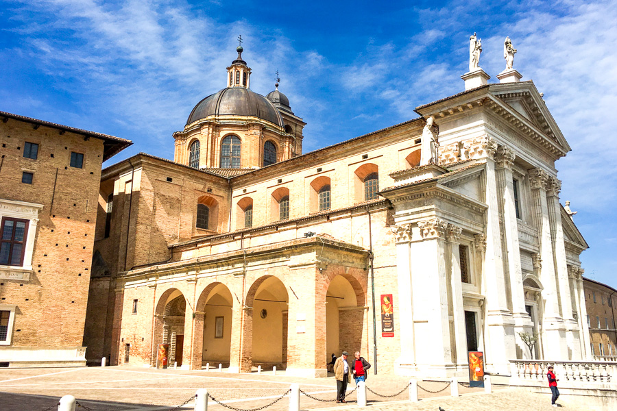 The beautiful exterior of Neoclassical Duomo di Urbino provides a fantastic introduction to the architecture of Italian hilltop towns.