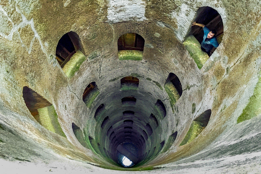 View down St Patrick’s Well in Orvieto, a 16th-century marvel or engineering that’s a must for your 10 day Italy itinerary.