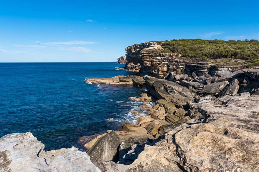 Blue skies and cliff views overlooking the Pacific on the Royal Coastal Track – a contender for best hiking in Sydney.