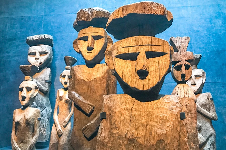 Mapuche totems on display inside the Museum of Pre-Columbian Art - one of the most fascinating things to do in Santiago.