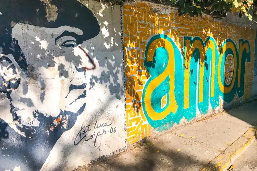 A Pablo Neruda themed mural on a wall in Santiago – enjoying street here is one of the more popular Santiago attractions.
