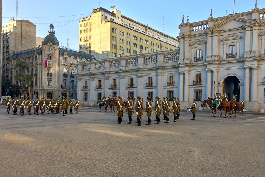The changing of the guard ceremony outside La Moneda Palace is definitely one to include on your Santiago itinerary.