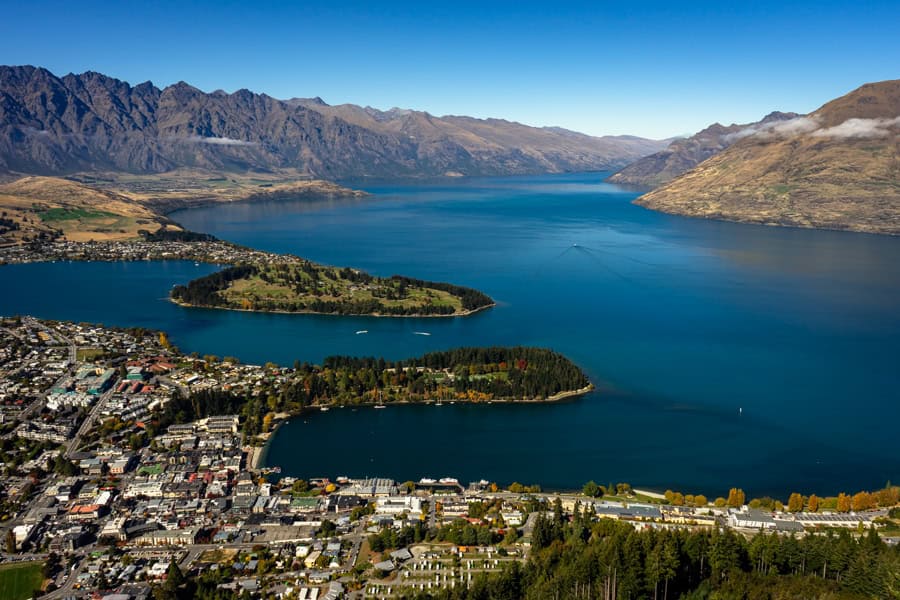 View over the city, lake and mountains of Queenstown.