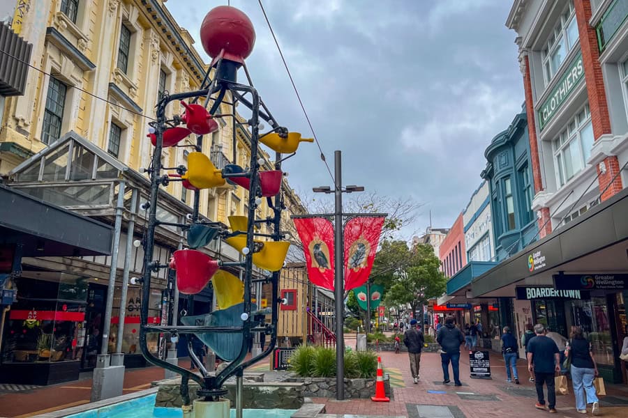 The colourful and iconic bucket fountain on lively Cuba Street – a night out here is a must when visiting Wellington.