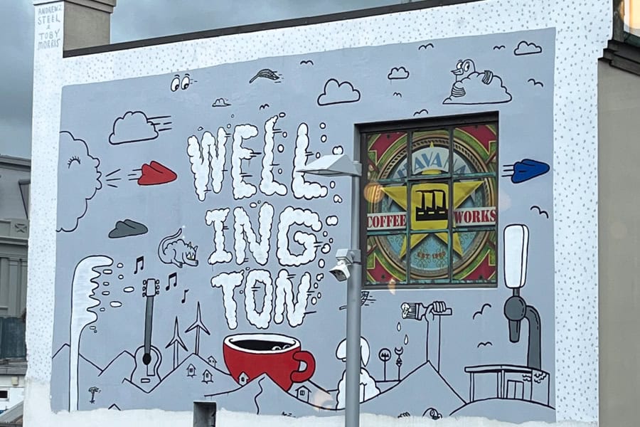 Graffiti on the side of a building highlights Wellington’s coffee obsession.