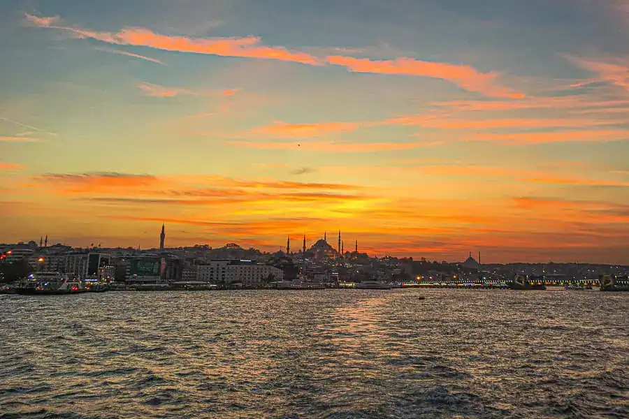 View from the ferry to Kadıköy on the Asian side at sunset - a benefit of picking two spots for your Istanbul accommodation.