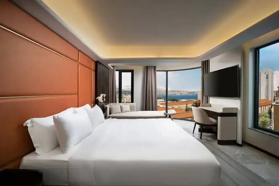 Spacious room with water views at the Bentley Hotel Bosphorus highlights the standard of high-end accommodation in Istanbul.