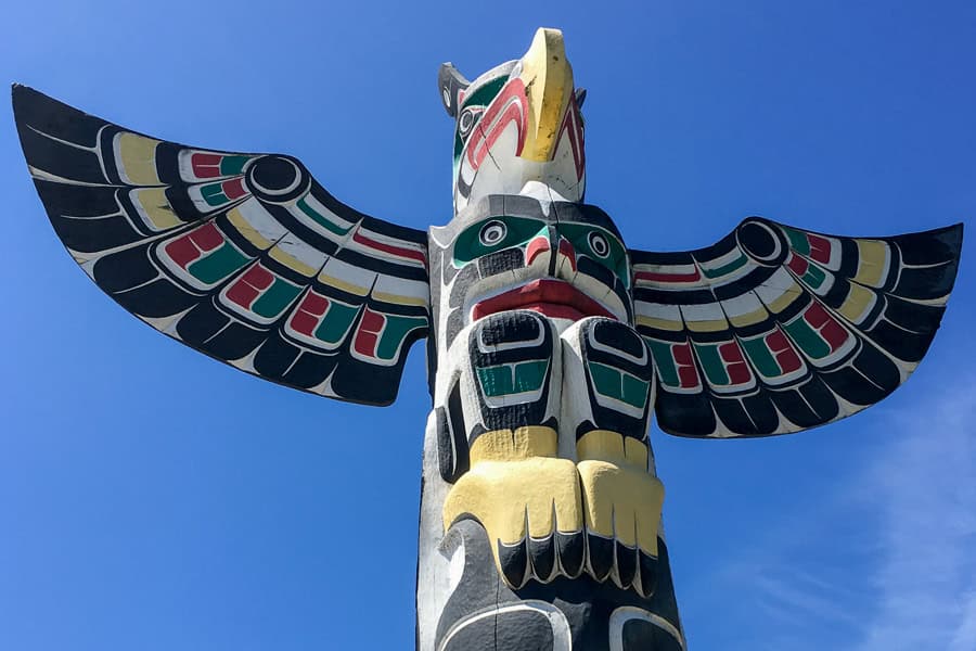 One of the colourful totem poles on the Duncan Totem Walk - a must do activity on any Vancouver Island itinerary.