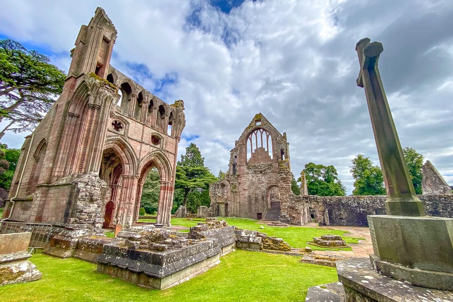View across the ruins of Dryburgh Abbey and the ornate vaulted transept that houses Sir Walter Scott’s tomb.